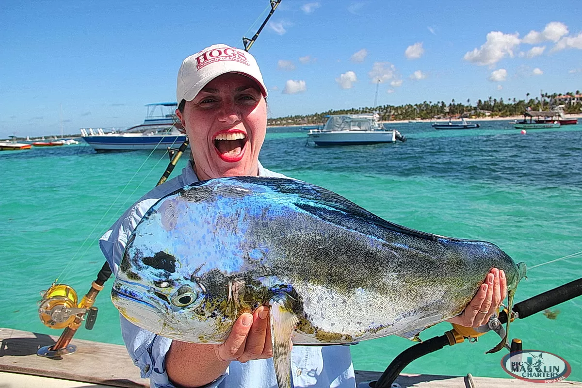 Happy gril with Dorado after fishing Punta Cana