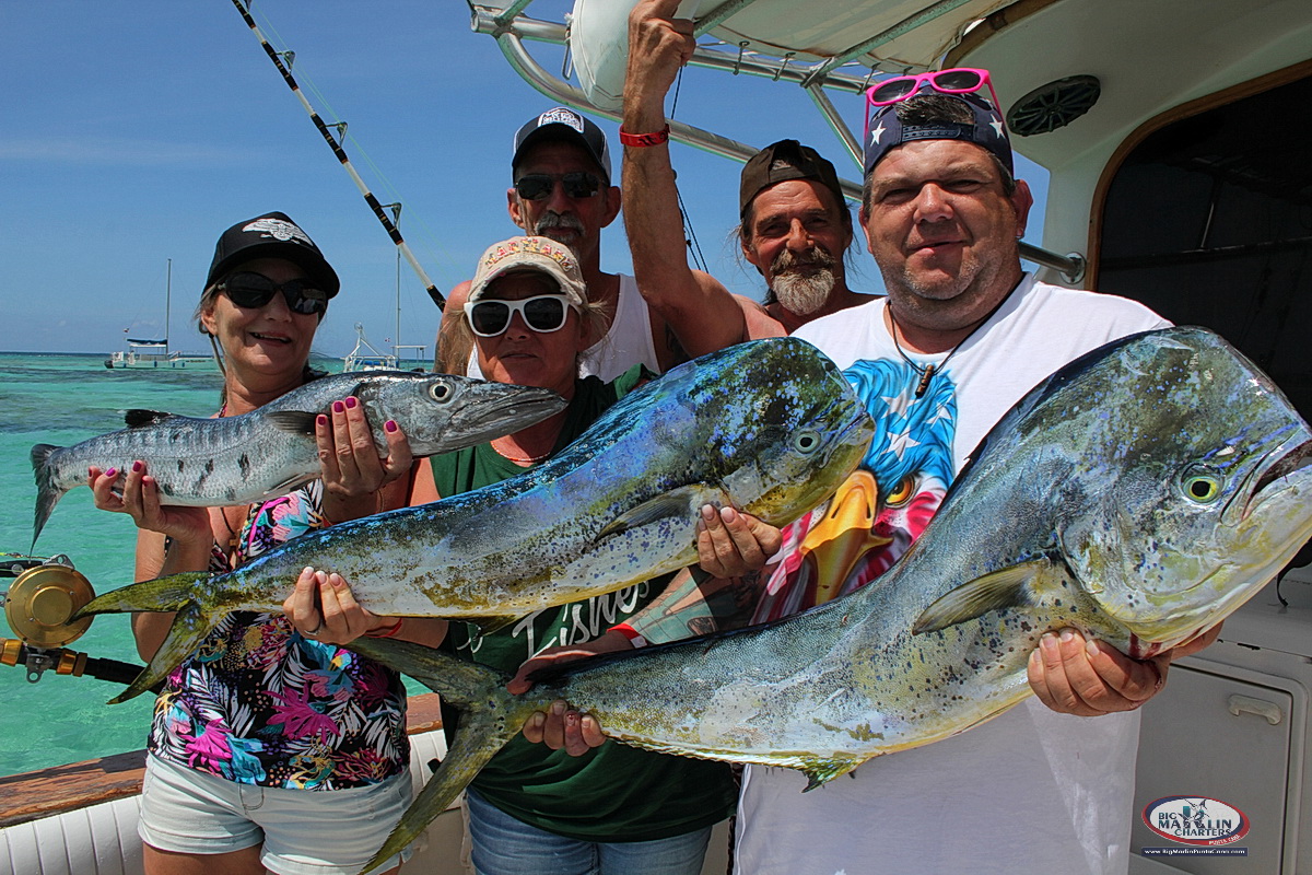 Group friends and Friendly fishing and catching Mahi Mahi boat Fortuna Ocean Super Sport