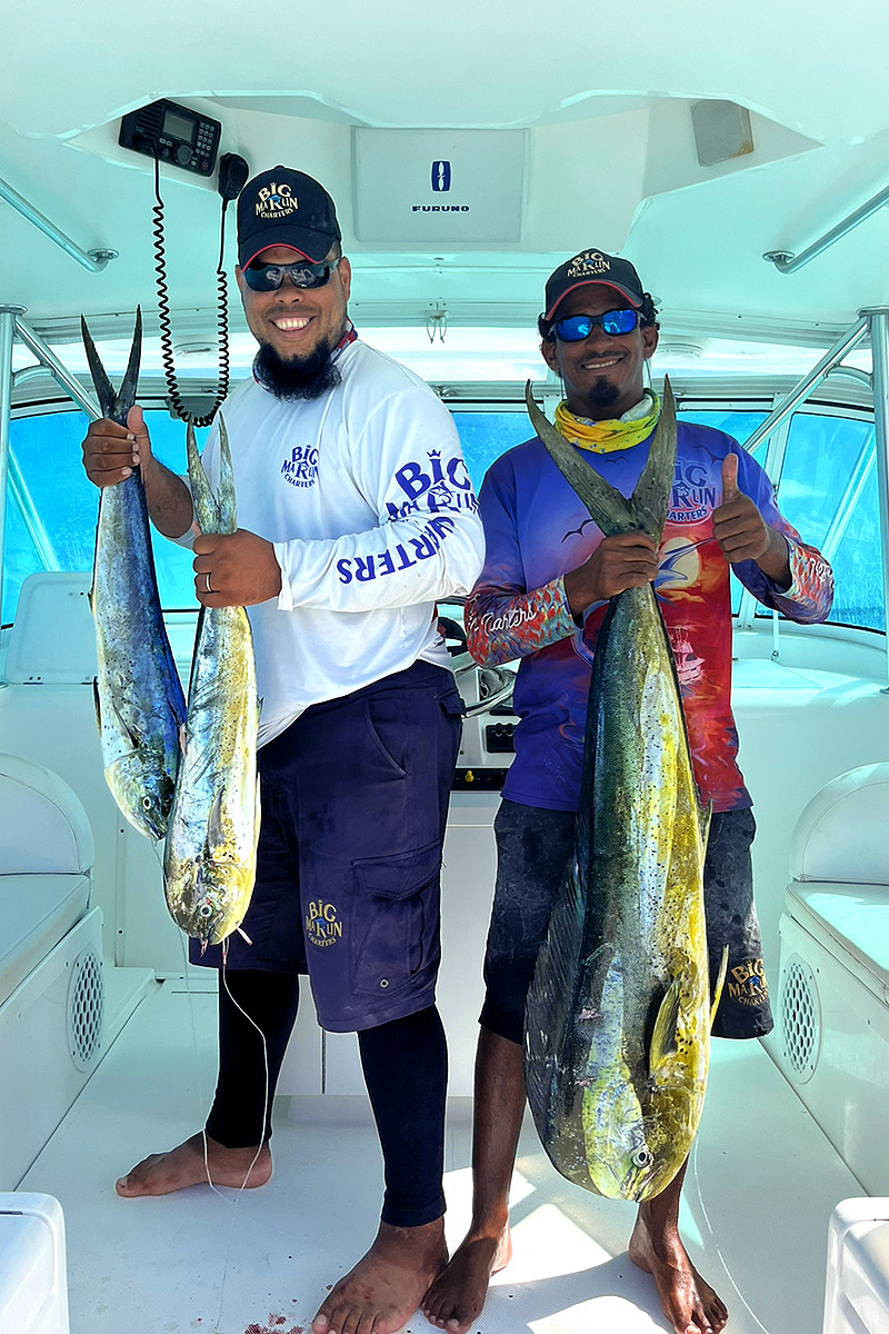 Capt. Miguel Blue Sky and Capt. Calvin fishing boat Cana